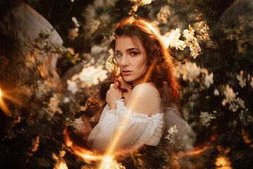 Portrait of a romantic girl, like a forest fairy, in a blooming garden with elements of...