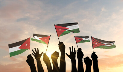 Silhouette of arms raised waving a Jordan flag with pride. 3D Rendering - obrazy, fototapety, plakaty