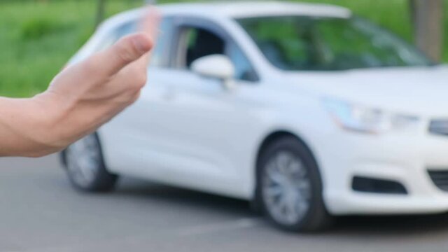 Selling or renting a car. The car owner hands over the keys to the new owner in exchange for money