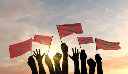 Silhouette of arms raised waving a Morrco flag with pride. 3D Rendering