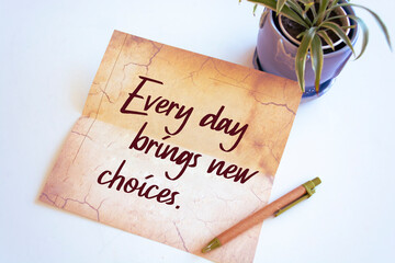 Inspirational motivational quote. Every day brings new choices.