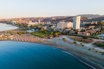 Aerial view of beach coast with boats near hotel in Cyprus