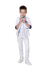 cute boy, posing against white background