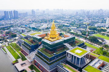 Obraz na płótnie Canvas Sappaya-Sapasathan (The Parliament of Thailand), Government office, Aerial top view National Assembly with golden pagoda on the chao phraya river in Bangkok 
