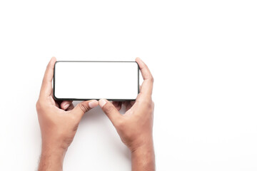 Hand holding a smartphone on a white background.