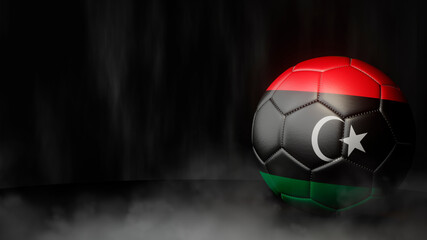 Soccer ball in flag colors on a dark abstract background. Libya. 3D image.