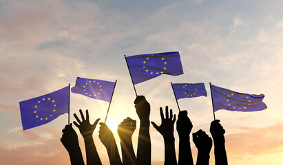 Silhouette of arms raised waving a European Union flag with pride. 3D Rendering - obrazy, fototapety, plakaty