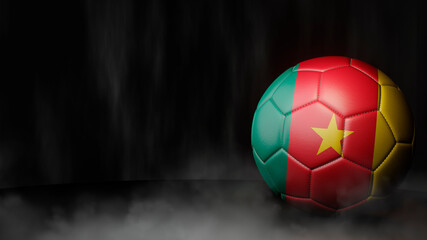 Soccer ball in flag colors on a dark abstract background. Cameroon. 3D image.