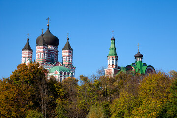 Fototapeta na wymiar Panteleimon Monastery in Feofania, Kyiv. Beautiful old red orthodox church. Crosses on the domes. Cathedral Area. The Feofaniya Park is one of the most beautiful places in Kiev, Ukraine