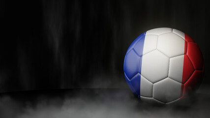 Soccer ball in flag colors on a dark abstract background. France. 3D image.