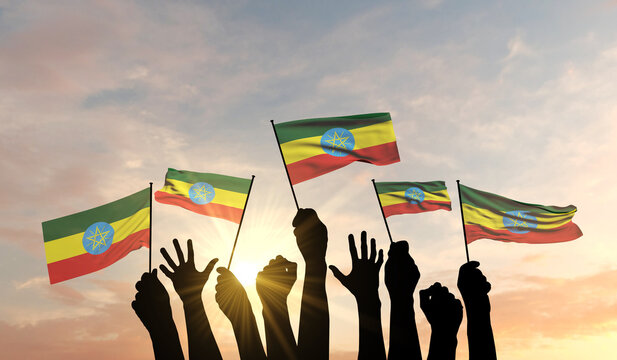 Silhouette of arms raised waving an Ethiopia flag with pride. 3D Rendering