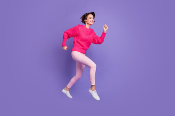 Fototapeta na wymiar Full length profile side photo of young girl happy smile jump go run speed hurry sale isolated over violet color background