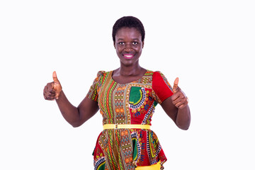 beautiful young woman showing her thumb while smiling.