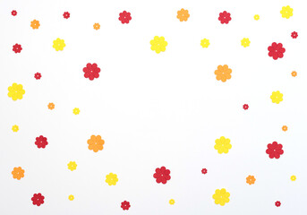 Bright red, yellow, orange paper flowers on white background. Spring, summer concept. Flat lay style with copy space