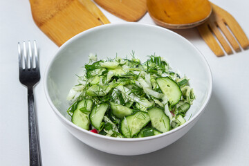 Diet salad of cucumbers and cabbage. Healthy diet. Vegetarian food