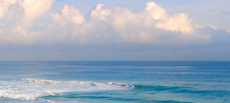 Tropical beach, azure ocean and blue sky. Travel concept. Wide photo.