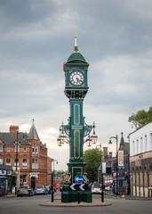 The Chamberlain Clock Jewellery Quarter Birmingham UK Green Edwardian clocktower standing at junction of Vyse and Frederick Streets with Warstone Lane. Monument to Joseph Chamberlain in Brum.  - obrazy, fototapety, plakaty