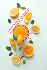 Tequila sunrise cocktail and ingredients on white background