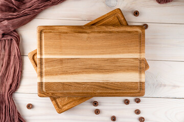 empty wooden cutting board on wooden table