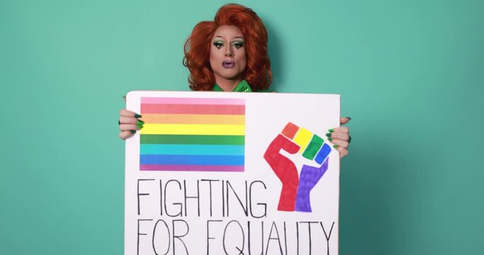 Happy drag queen holding gay pride banner - Lgbtq  concept 