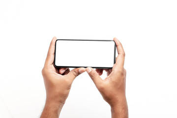 Hand holding a smartphone on a white background.