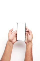 Hand holding a smartphone on a white background.