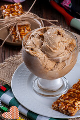 Peanut ice cream in a glass cup.