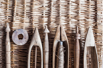 vintage looms wooden boat shuttles for hand weaving. The weft yarn is unwound from the tip of the...