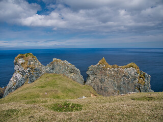 At the top of the Hill of Clibberswick, the Horns of Hagmark provide a recognisable landmark for seafarers - part of the ophiolite east coast of the island of Unst, in Shetland, UK