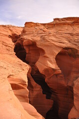 Eroded sandstone caves in famous Antelope Canyon on a sunny day near town Page, American Southwest, Arizona, USA