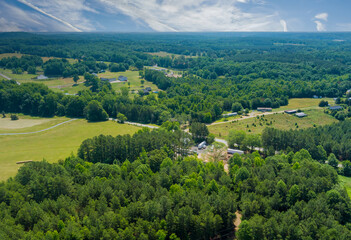 Fototapeta na wymiar Aerial on green forest view at summer time with good weather by mountains in Campobello town , South Carolina