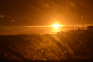 sunset though car window
