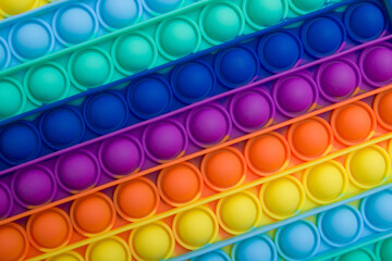 Clus up colorful trendy antistress sensory toys fidget push pop it texture - obrazy, fototapety, plakaty