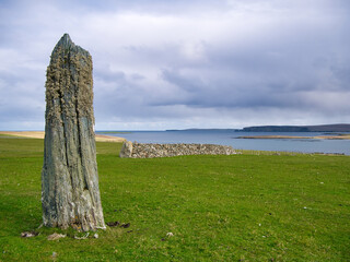 The single standing stone of Uyea Breck at Clivocast to the east of Uyeasound on the island of Unst...