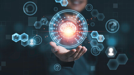 Businessman holding virtual brain with infographic for creative smart thinking idea and Artificial intelligence concept.