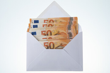 Fifty euro banknotes in an envelope, a lot of money 