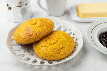 Broa, typical brazilian corn flour bread with coffee,jam and butter