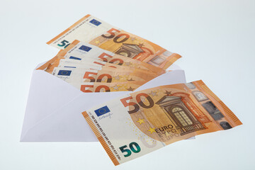 Fifty euro banknotes in an envelope, a lot of money 