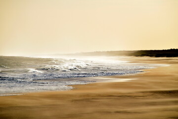 Fototapeta na wymiar waves on deserted beach