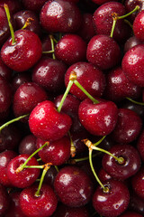 Close up of pile of ripe cherries background