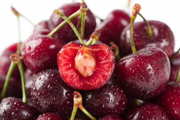 close up of ripe cherries fruit with sliced background.
