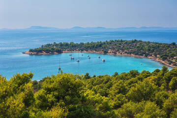 Amazing seascape, scenic panoramic view of the Kosirina beach, fantastic turquoise Adriatic sea, green trees and blue sky, Murter island, Dalmatia, Croatia. Outdoor travel background
