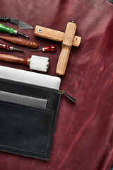 Tools for leather crafting and pieces of eather. Manufacture of leather goods.