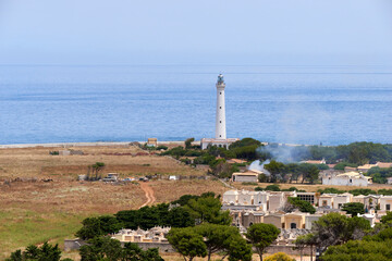 Fototapeta na wymiar the lighthouse of San vito lo Capo in sicily photographed with a telephoto lens