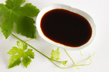  grape molasses and grape leaves
