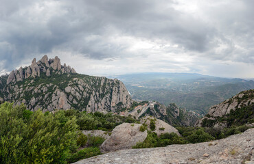Fototapeta na wymiar View towards Montserrat Abbey and valley bellow it, Barcelona, Spain.
