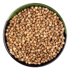 roasted buckwheat grains in round bowl isolated