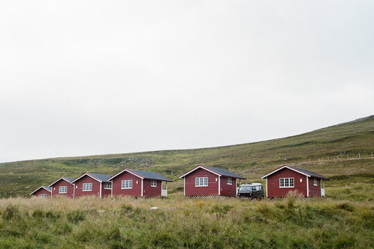 Brown row cabins in countryside