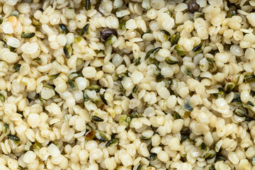 background - many cores of hemp seeds