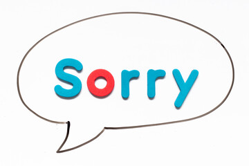 Alphabet letter with word sorry in black line hand drawing as bubble speech on white board background